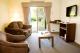 1 bed apartment living space - Mercure Bunbury Sanctuary Golf Resort