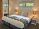 King bed in deluxe villa
 - MCY Sunshine Coast Airport to Tranquil Getaway on Obi Maleny Tranquil Getaways on Obi Maleny